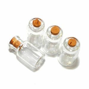 Four Glass Jars with Corks
