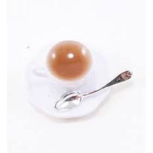 Cup of Tea on Saucer With Spoon