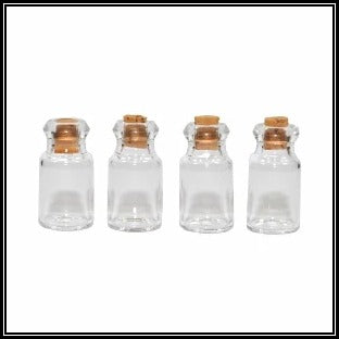Four Glass Jars with Corks