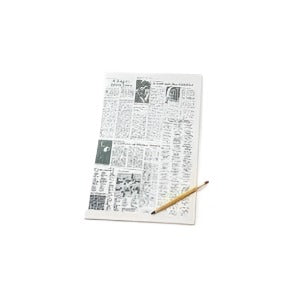 Newspaper With Crossword Puzzle And Pencil
