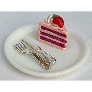 Strawberry cake on A Plate With Cutlery