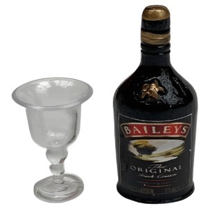 Bottle of Baileys And Empty Glass