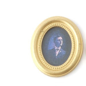 Gentleman Photo In An Oval Frame