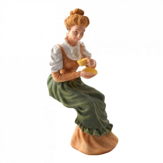 Lady Sitting Holding Cup